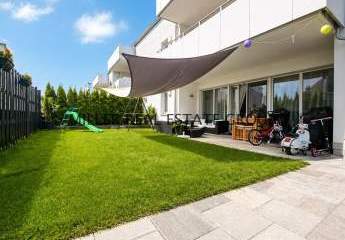 Moderne 4-Zimmer-Erdgeschosswohnung mit Privatgarten, Terrasse & zwei Tiefgaragenstellplätzen!