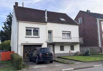 Einfamilienhaus mit 143 m² Wohnfläche, Garage und großem Grundstück