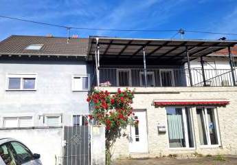 Saarlouis-Lisdorf: Interessantes, ca. 401m² großes MFH mit 4 Wohneinheiten, Gewerberaum und Garten