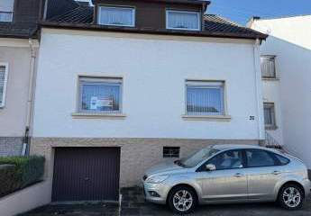 Schwalbach, TOP-Lage: Ansprechendes Reihenhaus mit Garten und Garage, auf 384 m² Süd-West-Grundstück