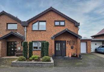 Großzügiges Reihenendhaus mit 144 m², Südgarten, Balkon & viel Nutzfläche inkl. Garage