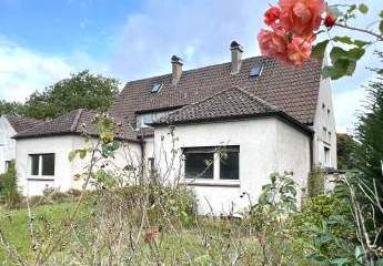 Ruhig und familienfreundlich wohnen: DHH mit großem Garten in Dortmund-Brackel (Sanierungsbedürftig)