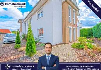 Moderne 3-Zimmer-Wohnung mit Einbauküche, Garten und Balkon in Syke