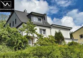 Wohnen mit Ausblick – Einfamilienhaus mit Einliegerwohnung und besonderem Charakter