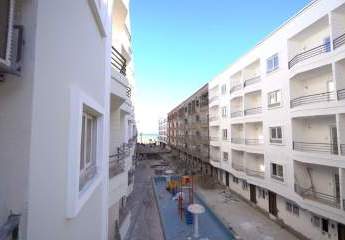 Wohnen am Meer: 1-Schlafzimmer-Wohnung mit Pool- & Promenadenblick