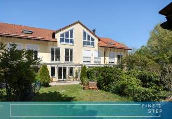 Ein familienfreundliches Haus mit außergewöhnlichem Grünblick, Garten und 2 TG-Plätze - nahe München
