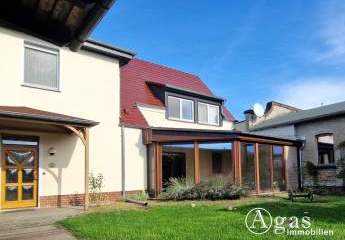 Vielseitiges Anwesen: Wohnhaus mit Wintergarten, großer Werkstatt (ca. 350 m²) und Doppelgarage