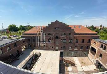 ATIK: Neubau mit Holzmassivdachstuhl im historischen Bahn-Betriebswerk Heidelberg