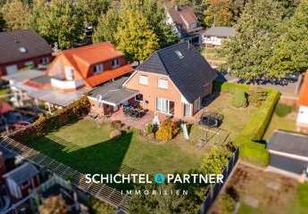Surheide | Schickes Einfamilienhaus mit Terrasse, Garage und großem Garten