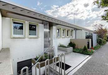 Architektenbungalow + Einliegerwohnung + separate Büroeinheit in Feldrandlage von DA-Arheilgen