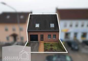 Großzügiges Einfamilienhaus mit Südgarten, 4 Schlafzimmern, Balkon & Garage nahe Saarpolygon